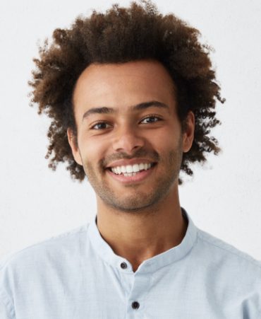 cheerful-african-guy-with-narrow-dark-eyes-and-flu-BL5NRS3-2.jpg