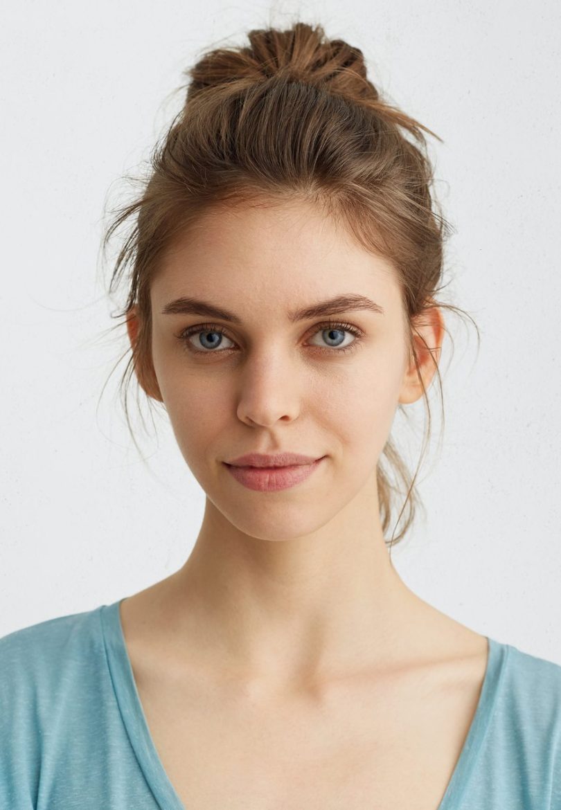 portrait-of-fair-haired-woman-with-warm-blue-eyes-HCAE3TB.jpg
